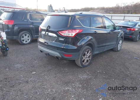 2014 Ford Escape Titanium z USA, uszkodzony, nr VIN 1FMCU0J9XEUA45182